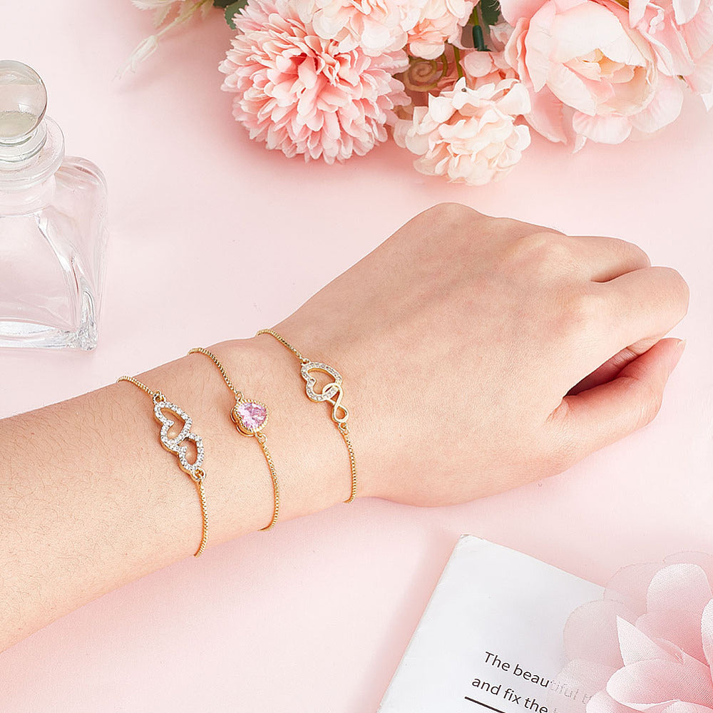Pulsera ajustable con dije de corazón