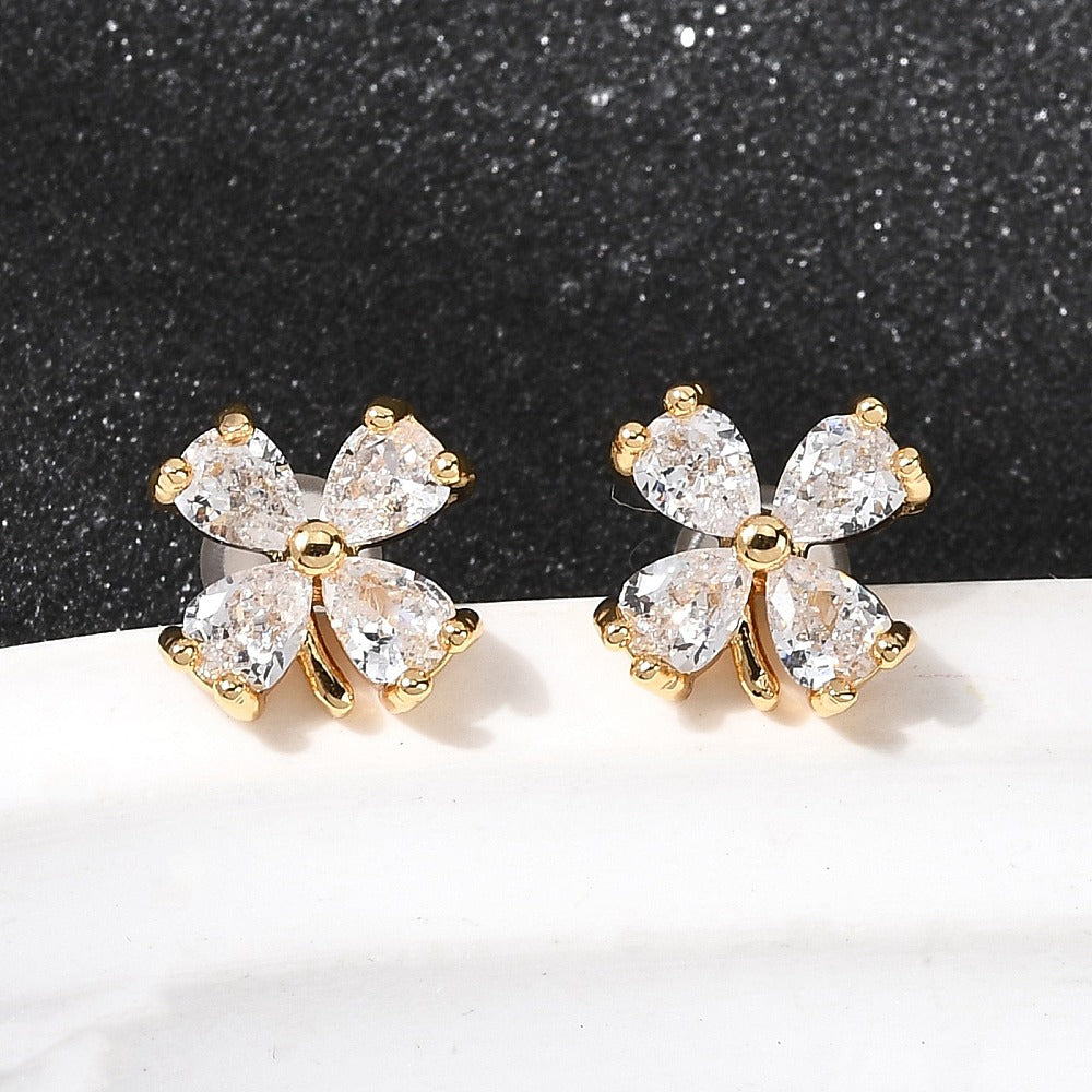 Aretes Flor pequeña de circonita cúbica transparente